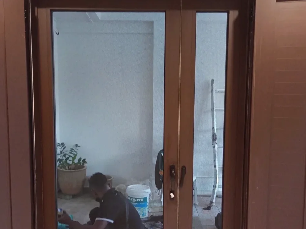 Main door with security mesh, film still on